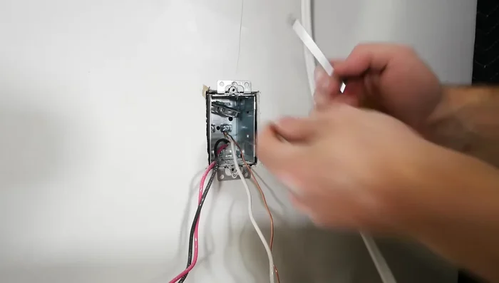 Connect the wires in the switch box (new light fixture wire to the switched hot, neutrals together, grounds together).