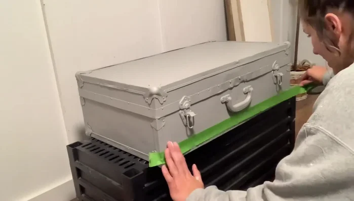 Paint the lines using Fusion Mineral Paint in Buttermilk Cream. The slightly thicker consistency of older paint can prevent seepage under the tape.