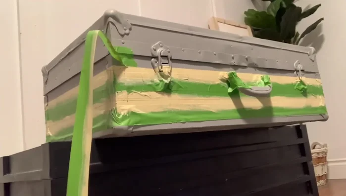 Remove the tape to reveal the lines. Repeat the taping and painting process for the second set of lines.