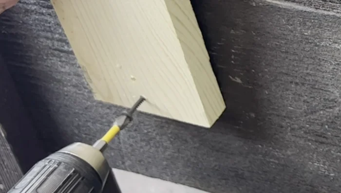 Secure the headboard top using dowels.