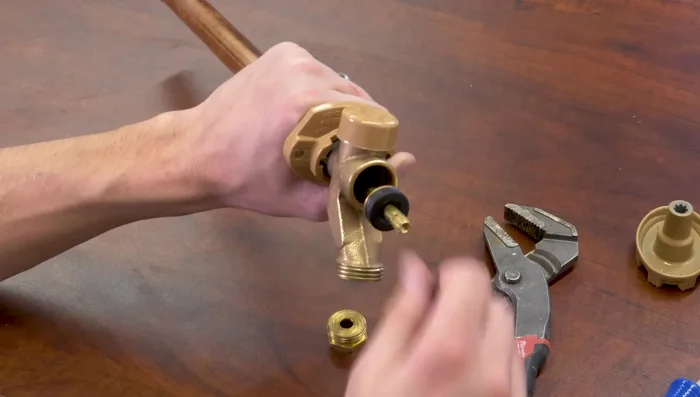 Remove the packing rubber and washer. Remove the valve stem (there will be resistance).