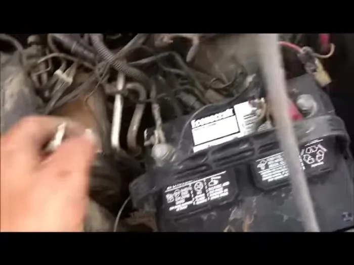 Touch the other end of the test light to the disconnected positive battery cable. If the light comes on, you have a short circuit.