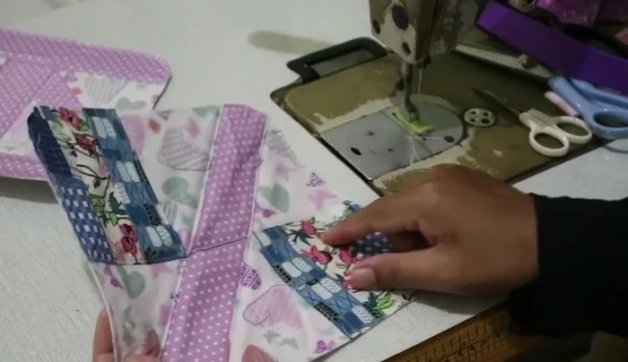 Apply patchwork to interlining; one for the base and one for the lid.