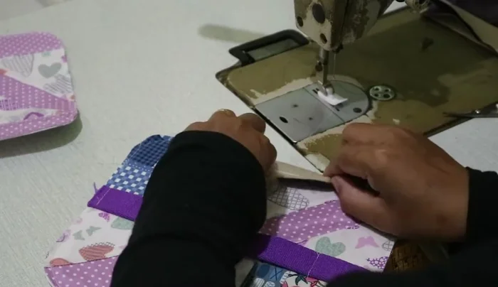 Sew the piping (optional: wrap with synthetic leather tape).