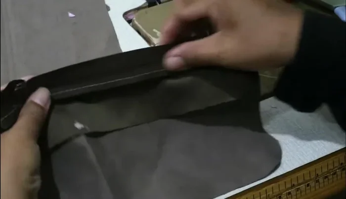 Sew the larger elastic pockets to the base.