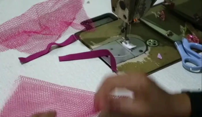 Sew the pockets to the divider.