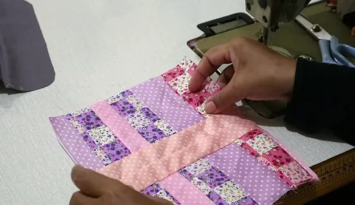 Sew the pockets to the divider.