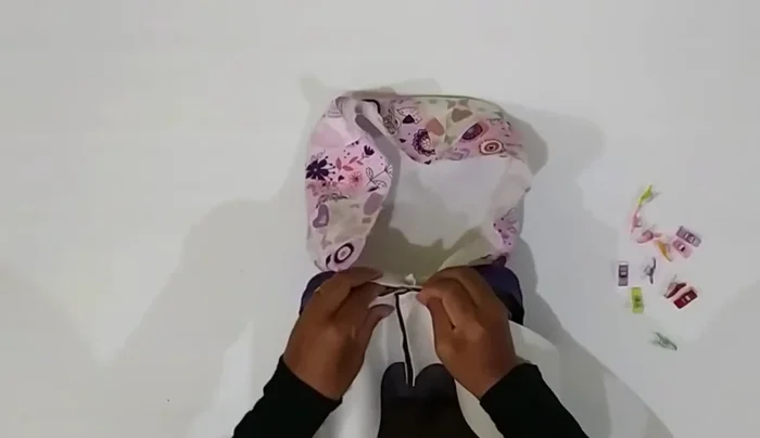 Top stitch all around the upper side of the main exterior.