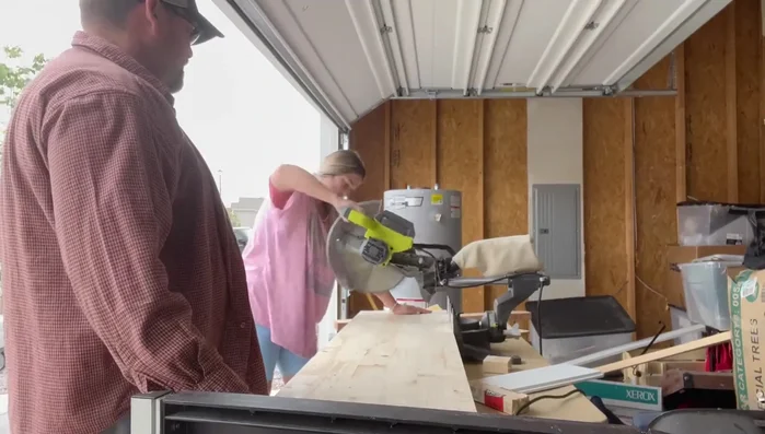 Create the countertop using a 1"x16" board, cut to size and sanded for a smooth edge. Stain to match existing elements.