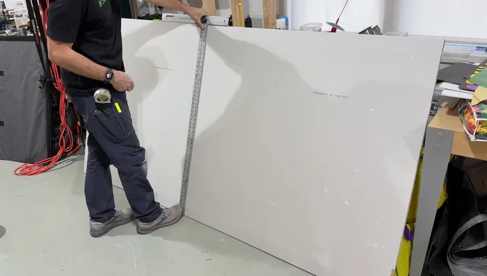 Prepare and install a new drywall patch.