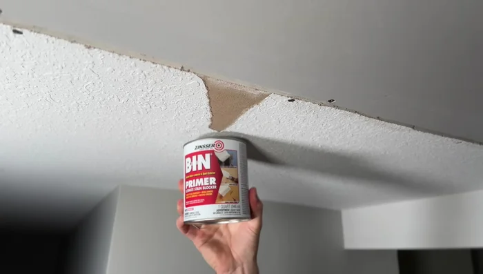 Prime the patch with shellac.