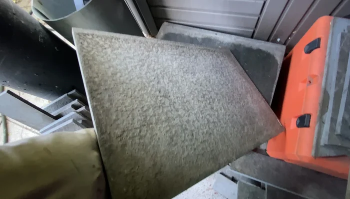 Measure and cut basalt tiles to the desired size (7 1/4 inches wide).