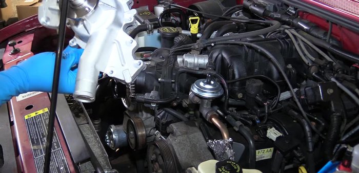 Install the new water pump gasket and install the water pump with twelve 8mm bolts, torquing them to 89 inch-pounds.