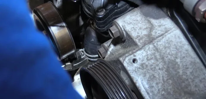 Install the water pump pulley (two bolts initially).