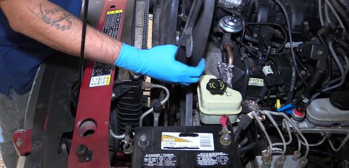 Install the remaining water pump pulley bolts.