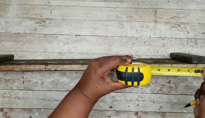 Mark shelf placement: Measure and mark 3" from the bottom and 10" from the bottom on both sides of the side panels to determine shelf positions. Transfer markings to the opposite side using a straight edge and tape.