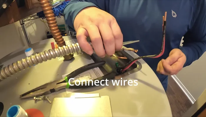 Reconnect the electrical wires (black to black, white to red, ground to green). Ensure secure connections.