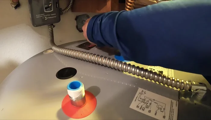 Reconnect the pressure relief valve pipe.