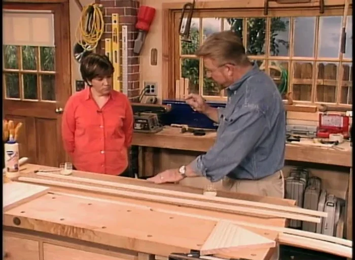 Apply wood glue to the back of wood molding strips and attach them to the edges of the pegboard to add thickness and cover raw edges.