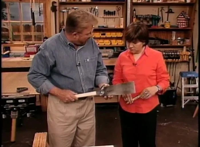 Apply wood glue to the back of wood molding strips and attach them to the edges of the pegboard to add thickness and cover raw edges.