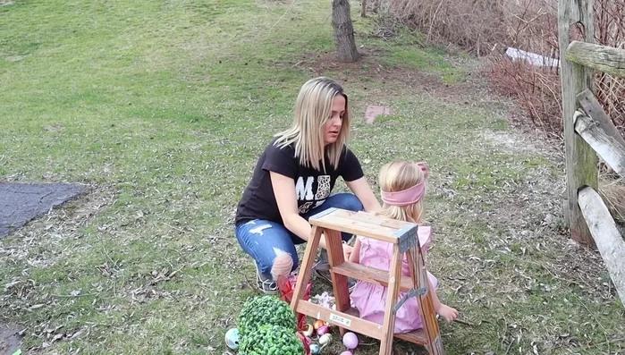 Position your child: Consider shooting at eye level, especially with younger children. Use a step stool or other prop to elevate them if needed.