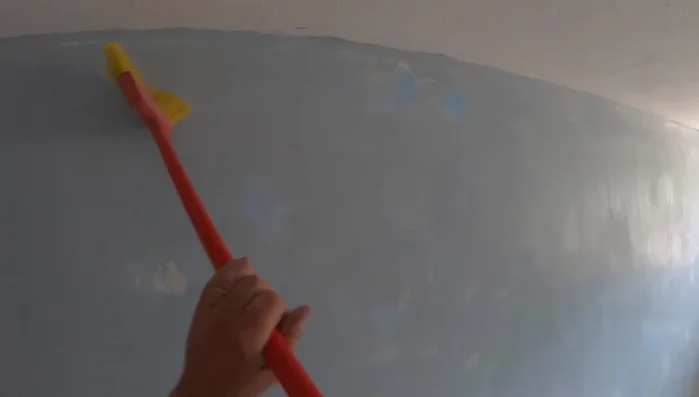 Sweep the walls to remove dust.