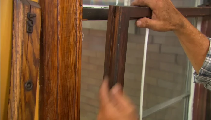 Temporarily secure the cord with a nail to keep it taut while replacing the sash.