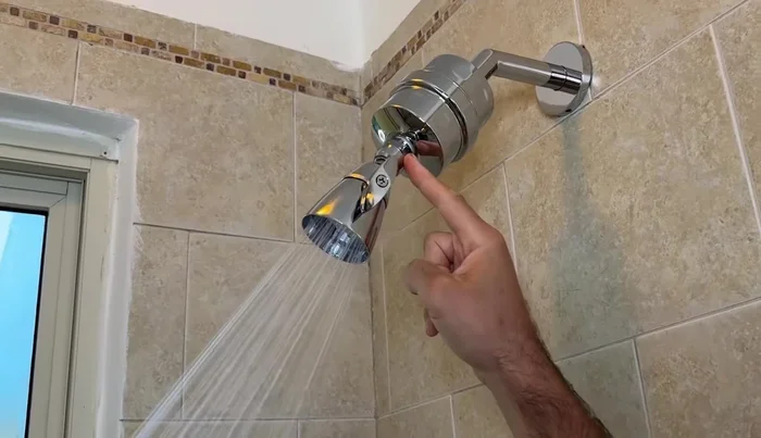 Check for leaks at the shower head and filter connections.
