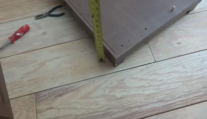 Cut the dresser down to the desired height using a saw.
