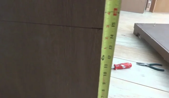 Cut the dresser down to the desired height using a saw.