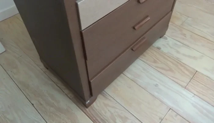 Remove drawers and assess the dresser's condition. Determine if repairs are feasible or if a repurposing approach is necessary.