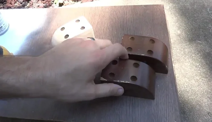 Sand the feet and handles to raw wood.