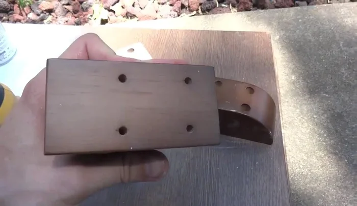 Sand the feet and handles to raw wood.