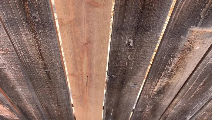 Secure the new picket using screws into the supporting 2x4s.