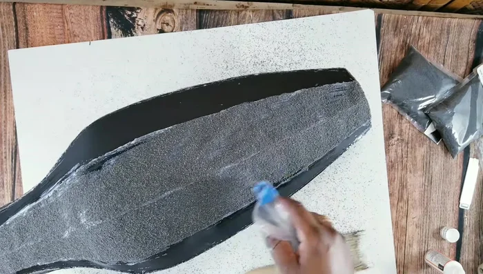 Seal the sand with a cloth and Mod Podge.