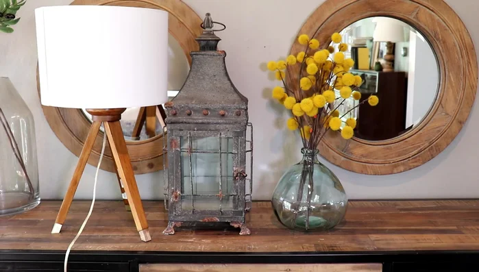 Sort items by height: tall items (focal pieces) and short items (fillers).