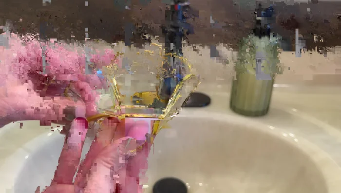 Place a vessel with hydrangeas on the vanity, and add hand towels.