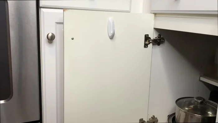 Organize Cabinet Doors with Adhesive Hooks and Holders