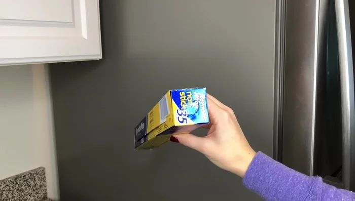 Store Saran Wrap/Tin Foil with Command Hook