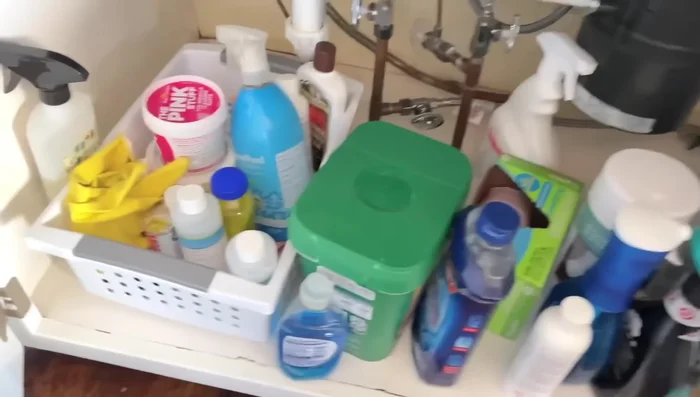 Organize Kitchen Cupboard with Vertical Tension Rods