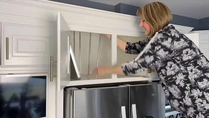 Organize Kitchen Cupboard with Vertical Tension Rods