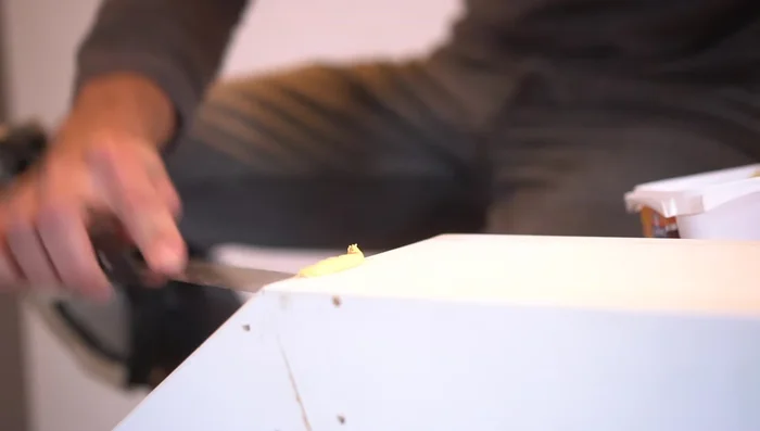 Paint the trim using a foam roller for a smooth, uniform finish. Apply a second coat if necessary.