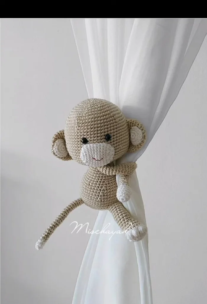 Contemporary Choice: Sleek geometric metal curtain tiebacks offer a minimalist yet functional solution.