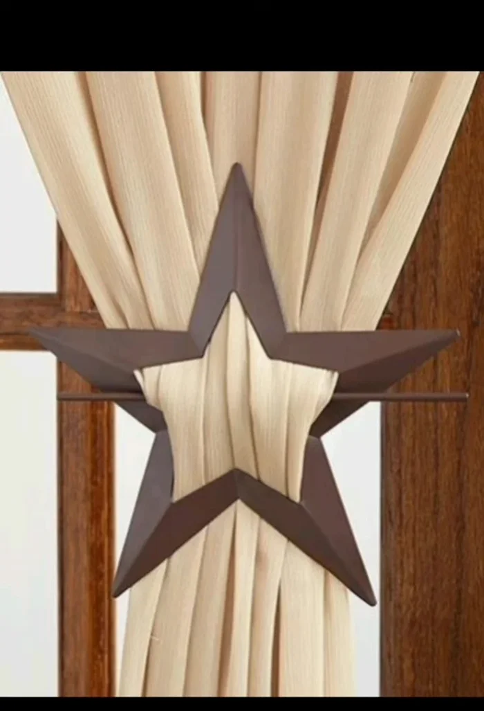 Contemporary Choice: Sleek geometric metal curtain tiebacks offer a minimalist yet functional solution.