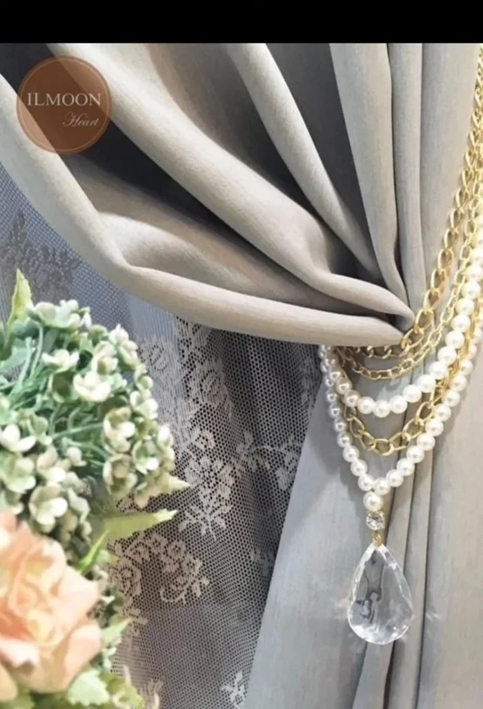 DIY Option: Make your own metal curtain tiebacks to perfectly match your decor.