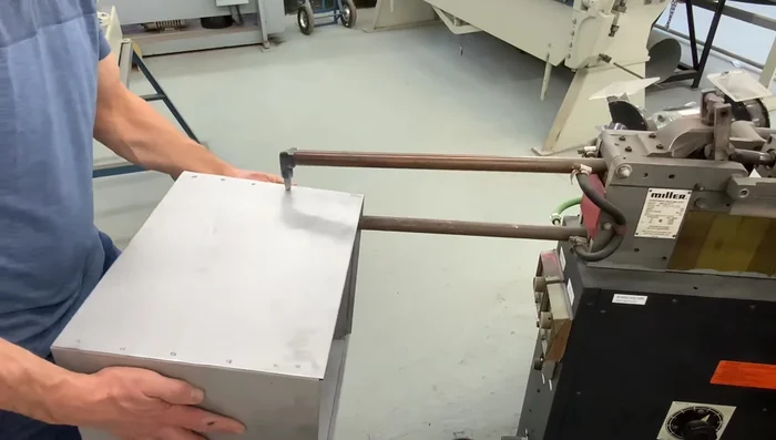 Fastening the corners: Use a spot welder to fasten the corners. Alternatively, pop rivets, screws, or welding (for heavier gauge metal) can be used.