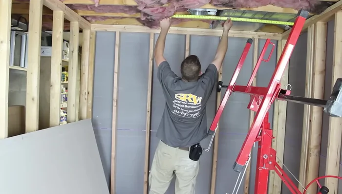 Measure and mark the locations of any recessed lights, vent cans, or other fixtures on the ceiling.