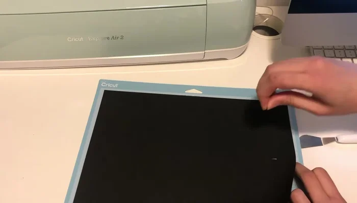 Peel off the cut cardstock from the Cricut mat.