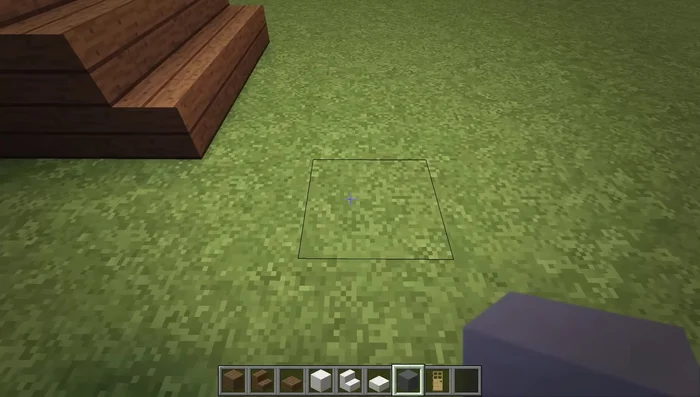 Add a layer of cyan clay along the top row of the walls and black stained glass panes in the gaps between the walls.