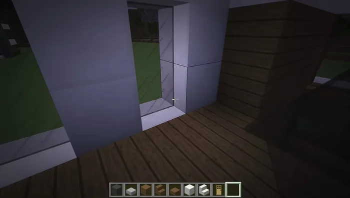 Add a railing using black stained glass panes at the edge of the staircase.